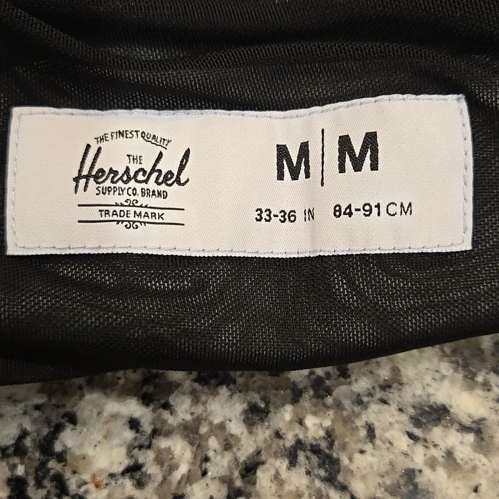 HERSCHEL SUPPLY CO. GREY SWIM TRUNKS. SIZE MEDIUM . 33-36 INCHES.